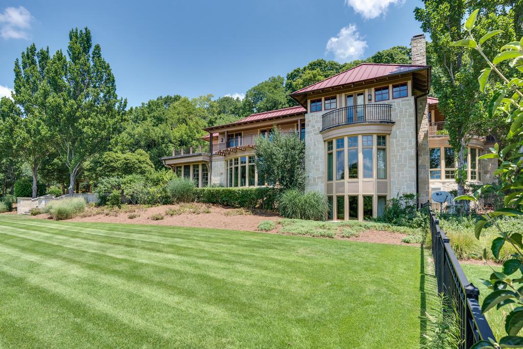 1710 Lawrence Road Franklin, TN 37069 - Photo 4 of 30 a front view of a house with a yard
