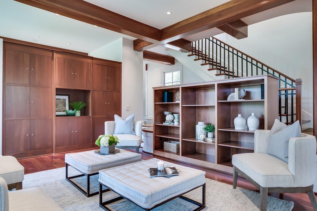 1710 Lawrence Road Franklin, TN 37069 - Photo 10 of 30 a living room with furniture a rug and a bookshelf