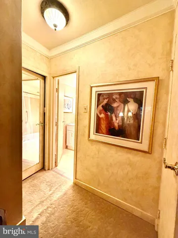 a view of a room with a large window with outer view