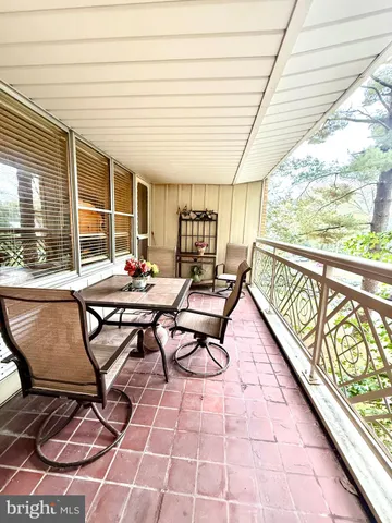 a outdoor space with lots of tables and chairs
