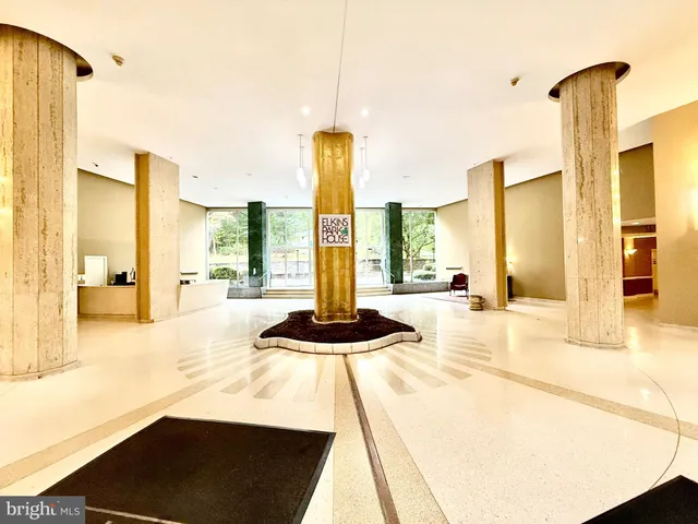 a view of a living room with furniture