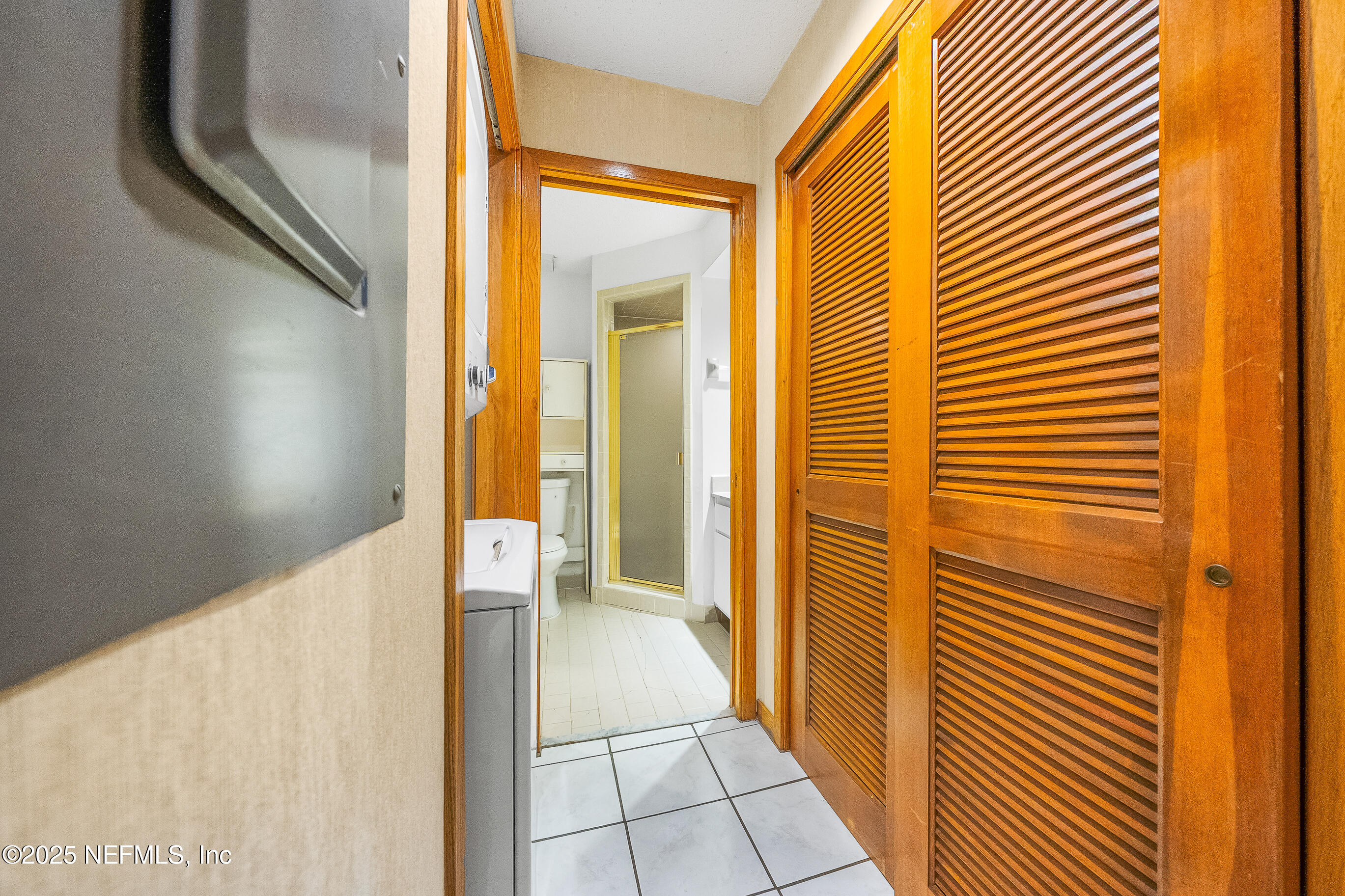 2930 Ravines Road, Unit 1226 Middleburg, FL 32068 - Photo 12 of 30 a view of a hallway with wooden floor