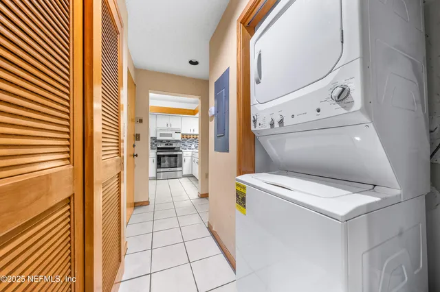 a view of a bathroom from a hallway