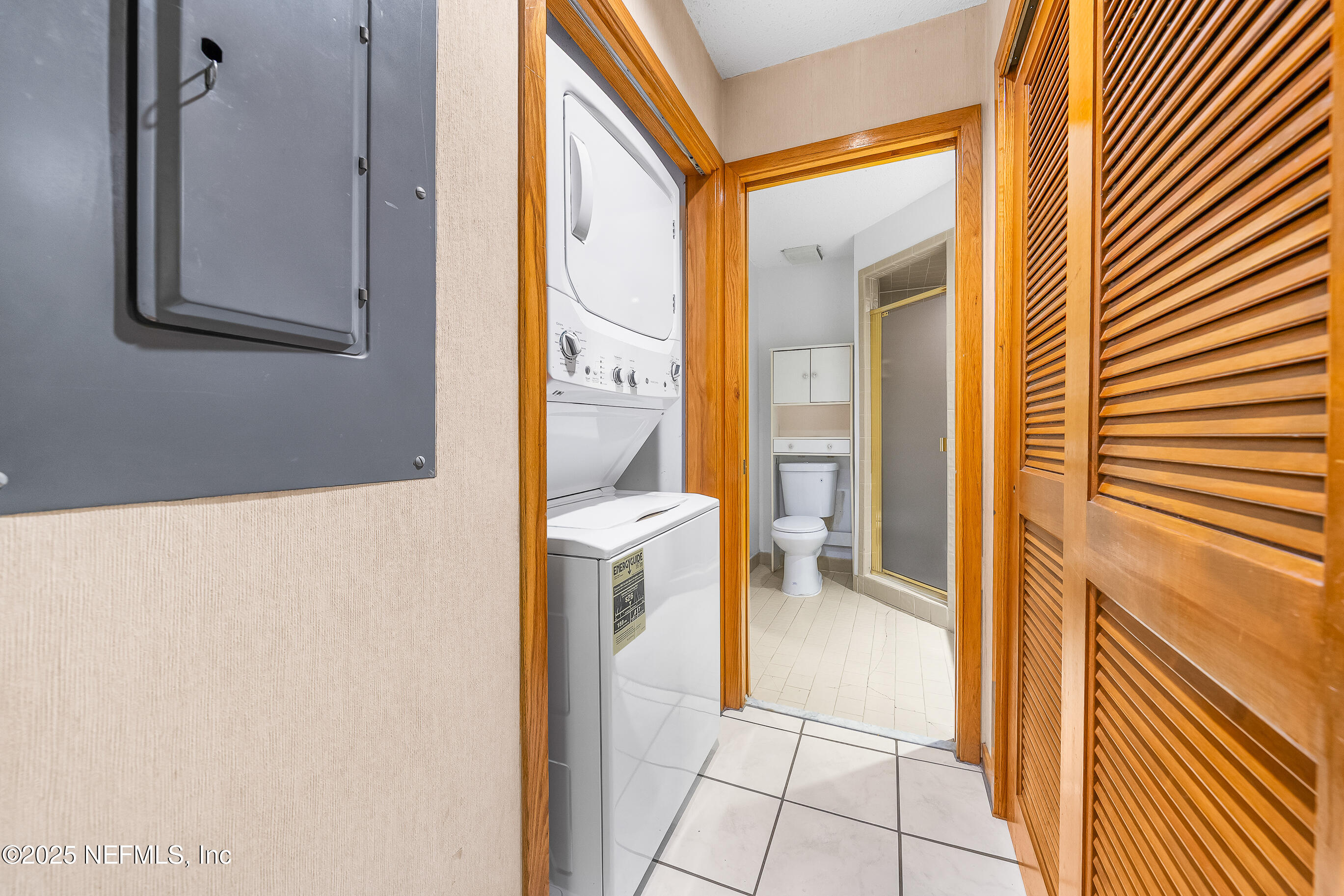 2930 Ravines Road, Unit 1226 Middleburg, FL 32068 - Photo 14 of 30 a view of a bathroom from a hallway