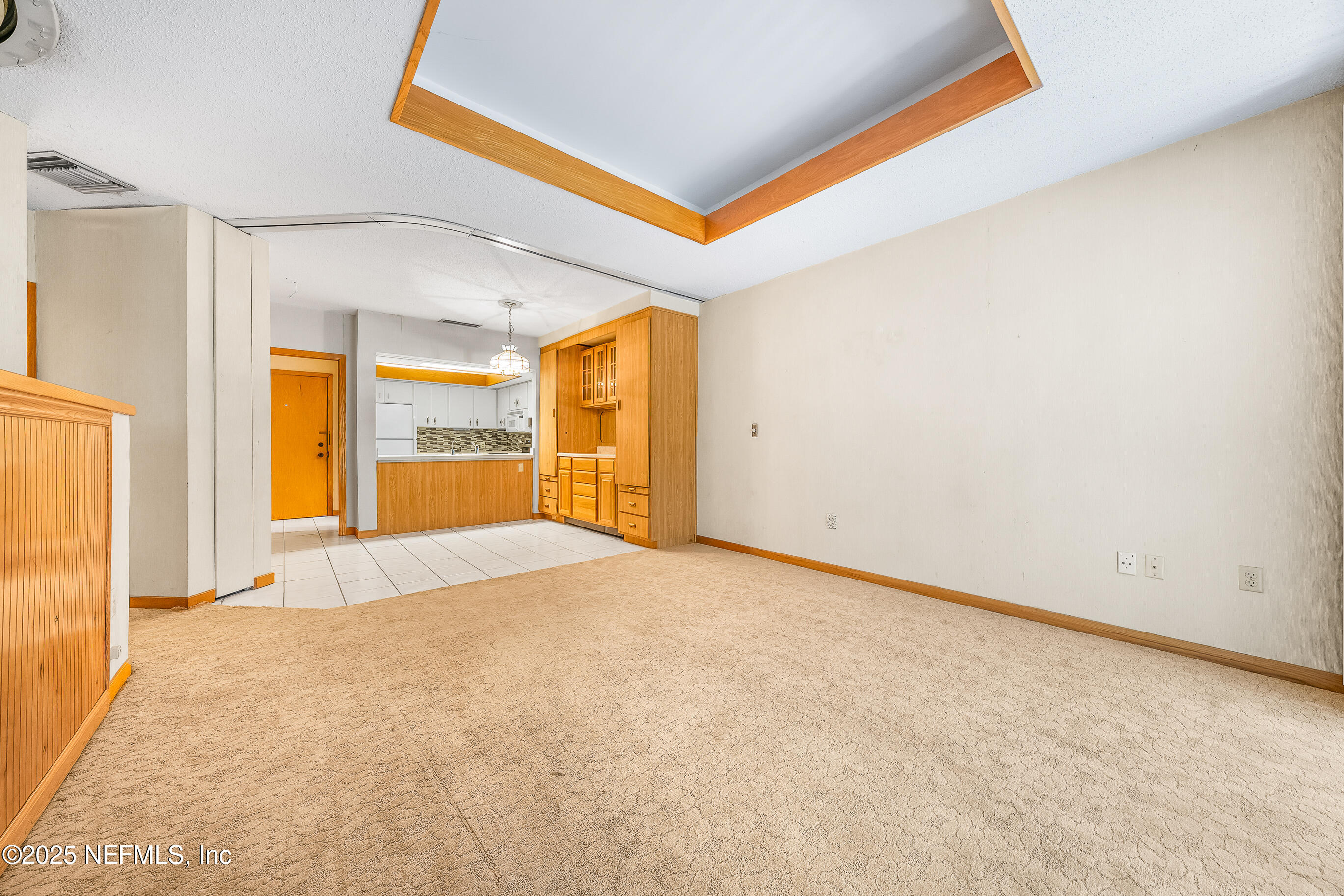2930 Ravines Road, Unit 1226 Middleburg, FL 32068 - Photo 19 of 30 a view of an empty room with a window