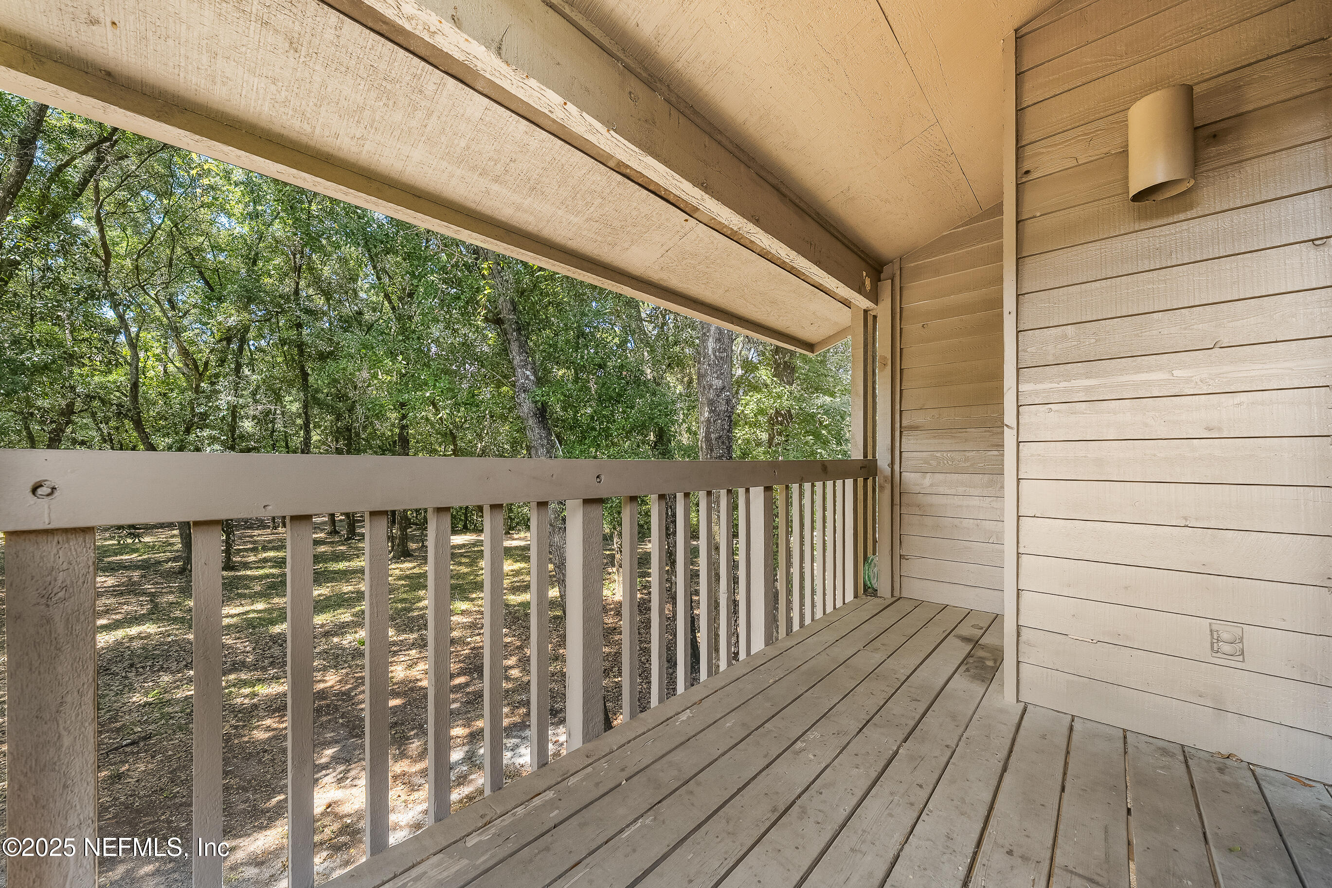 2930 Ravines Road, Unit 1226 Middleburg, FL 32068 - Photo 30 of 30 a view of balcony with wooden floor