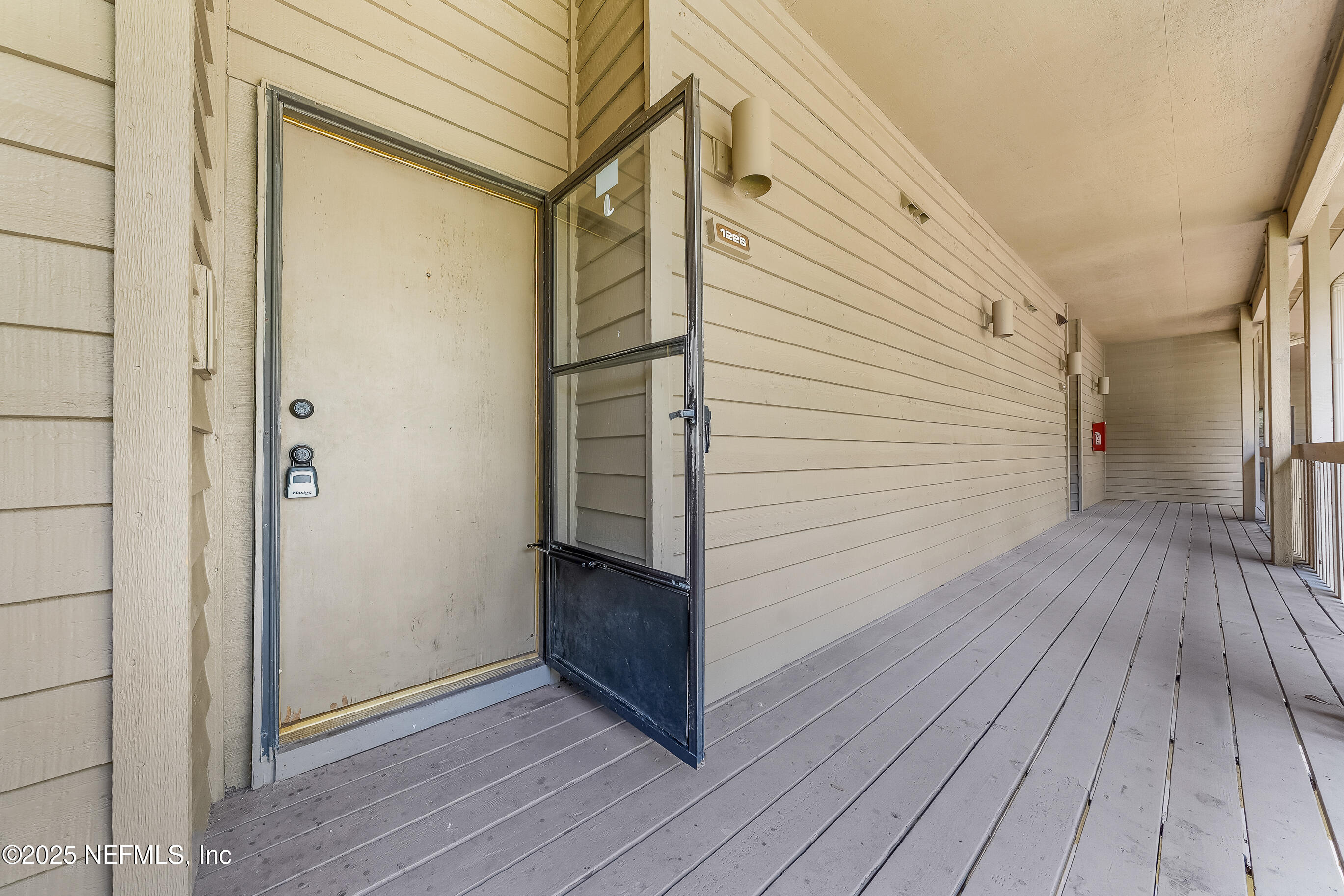 2930 Ravines Road, Unit 1226 Middleburg, FL 32068 - Photo 3 of 30 a view of wooden floor in a house
