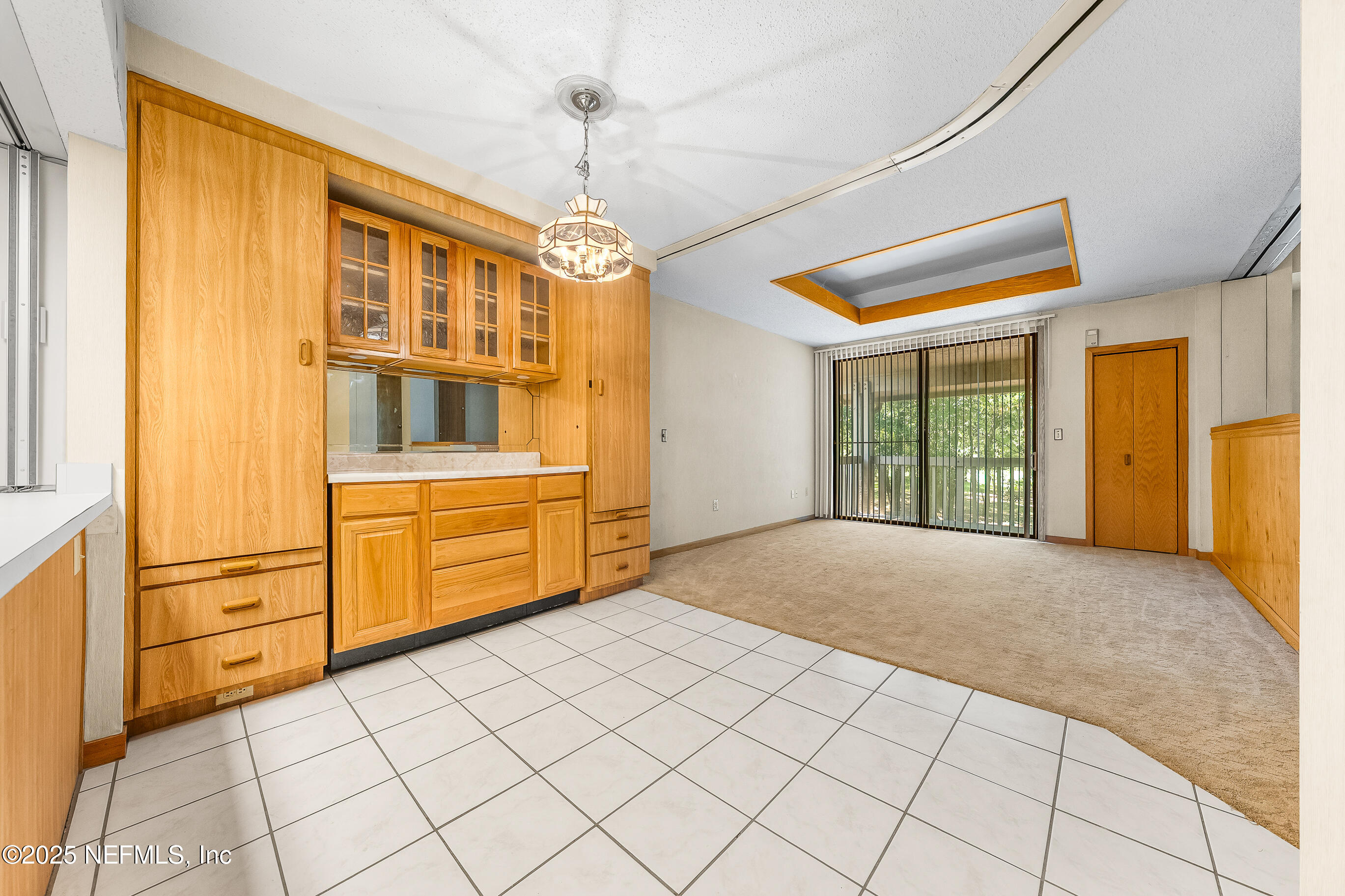 2930 Ravines Road, Unit 1226 Middleburg, FL 32068 - Photo 7 of 30 a view of an empty room with a window