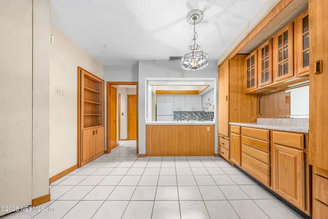 a bathroom with a tub and a sink