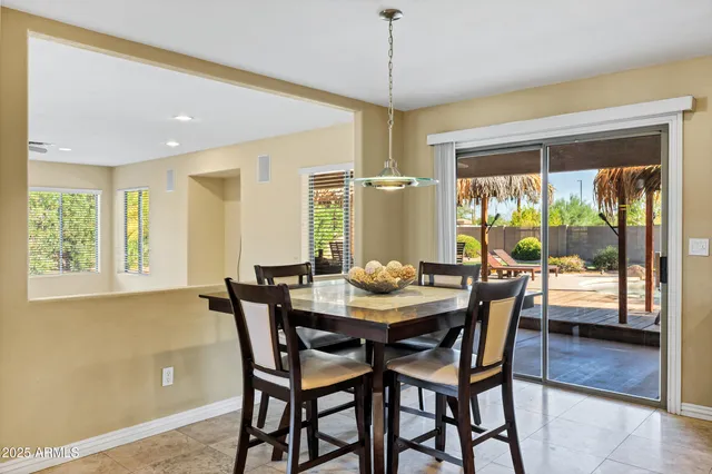 a bathroom with a sink a vanity and a mirror