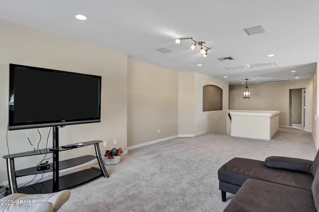 a bedroom with a bed and a fireplace