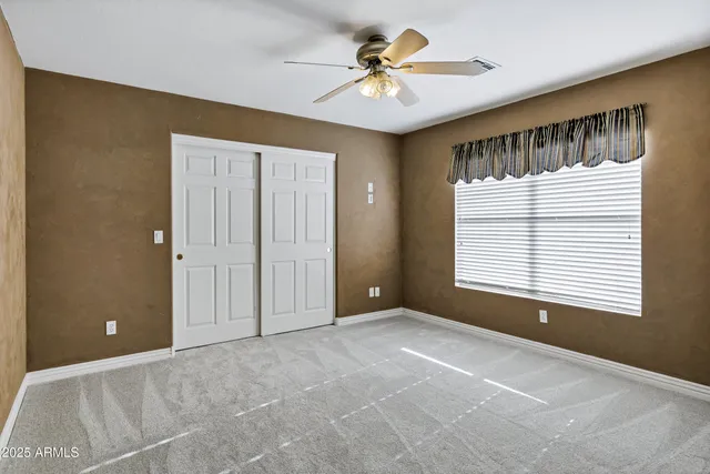 a view of a house with swimming pool garden and patio