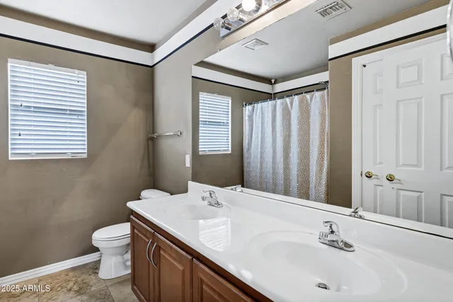 a view of a back yard of the house