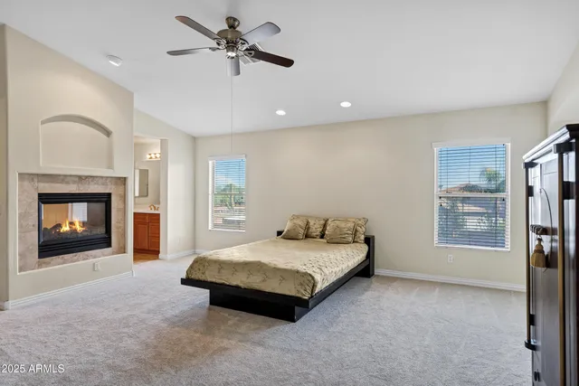 a view of a swimming pool with sitting area