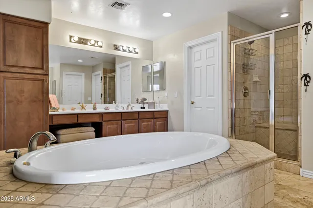 a view of a swimming pool with outdoor seating