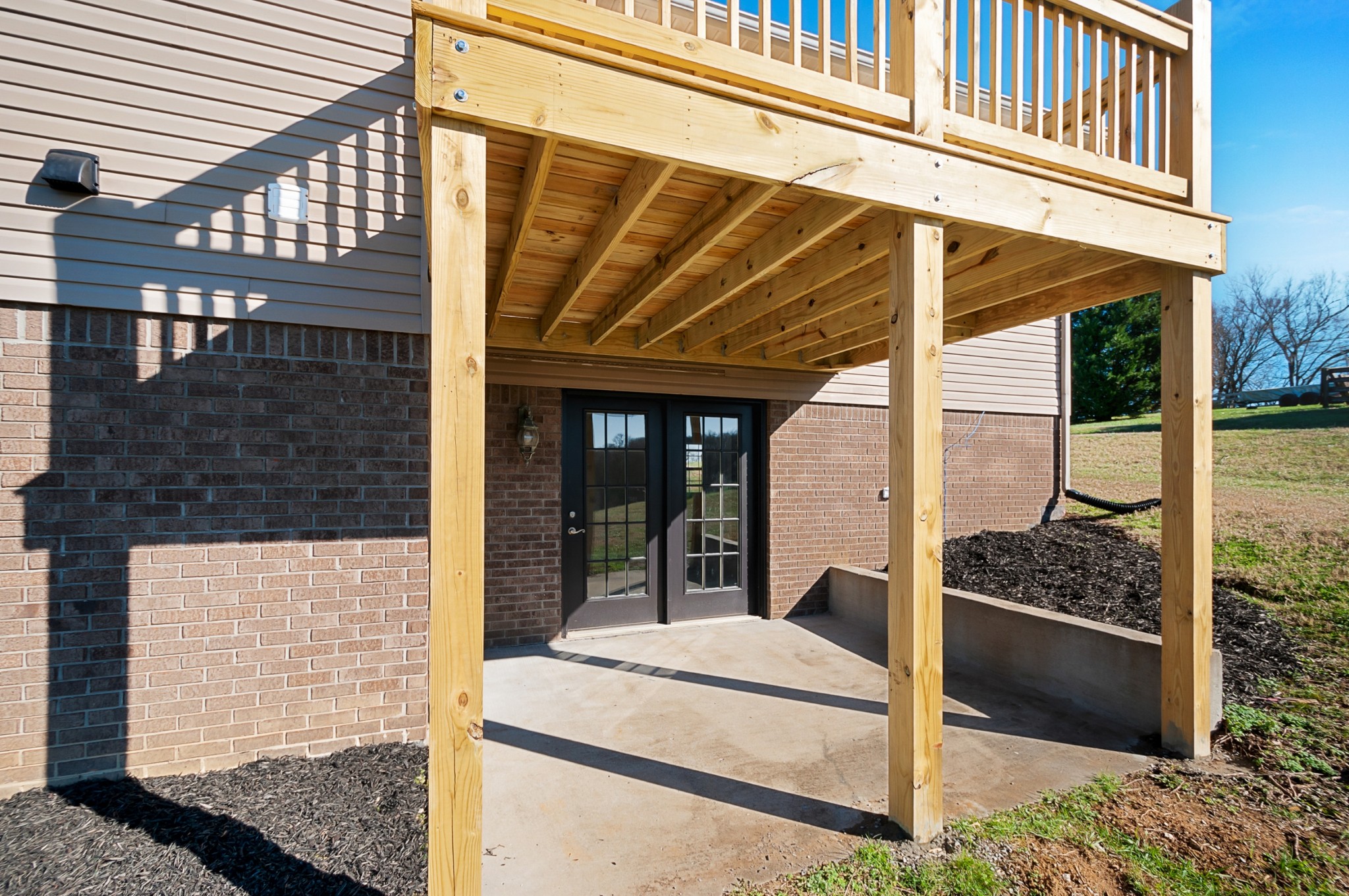 1933 Clara Mathis Road Spring Hill, TN 37174 - Photo 42 of 50 a view of a porch with a bench