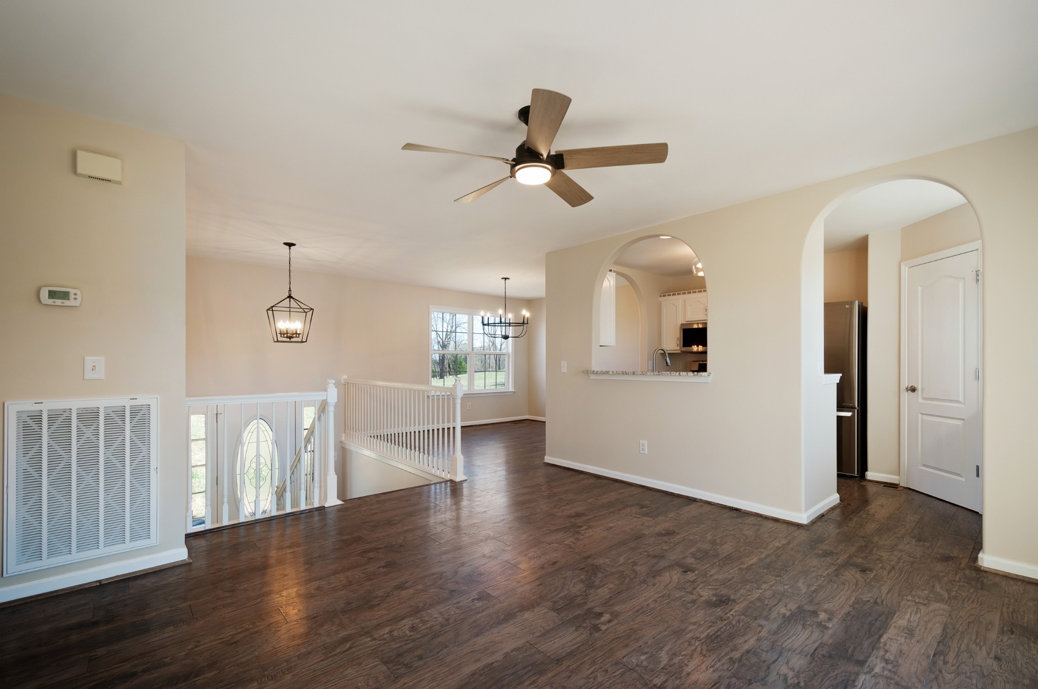 1933 Clara Mathis Road Spring Hill, TN 37174 - Photo 9 of 50 wooden floor in an empty room with a window