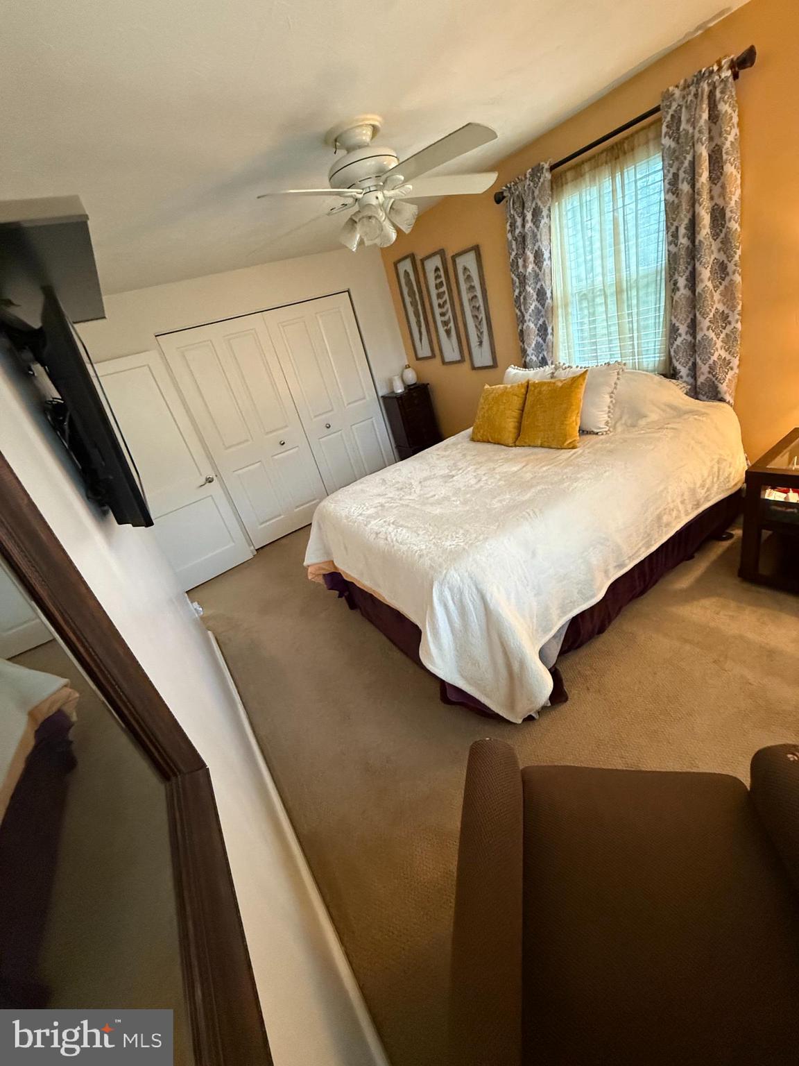 2235 Hawthorne Road Baltimore, MD 21220 - Photo 14 of 35 a bedroom with a bed and wooden floor
