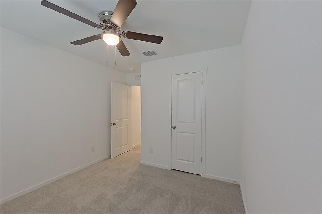 827 Ginkgo Way Princeton, TX 75407 - Photo 15 of 27 en empty room with fan
