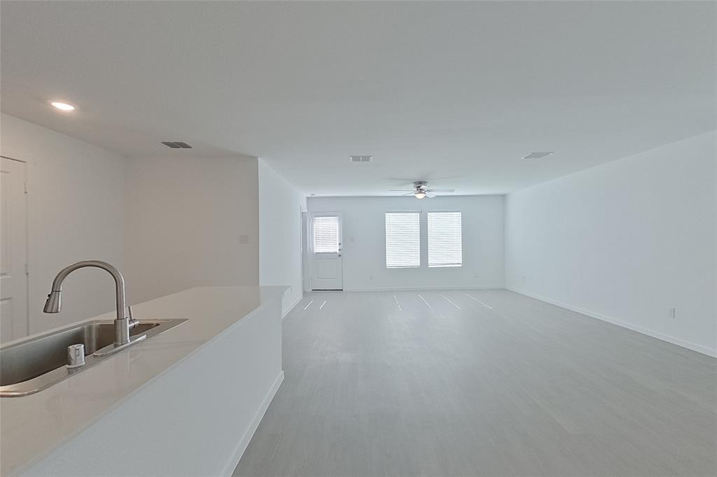 827 Ginkgo Way Princeton, TX 75407 - Photo 6 of 27 a view of an empty room with a sink