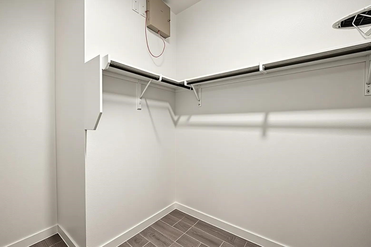 33142 School Hl Road Fulshear, TX 77441 - Photo 19 of 29 a view of small space with racks on the wall