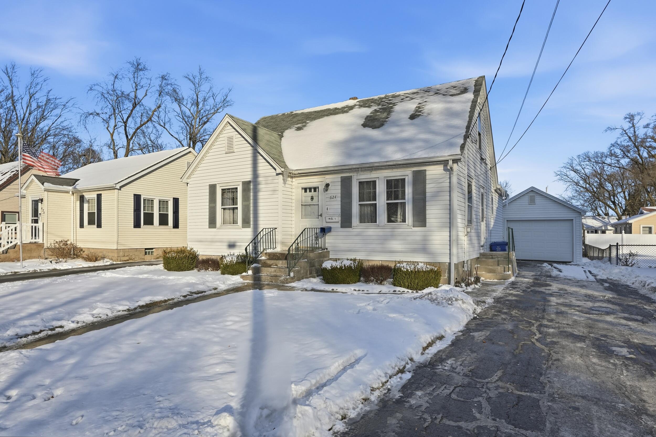 624 North West Street Crown Point, IN 46307 - Photo 2 of 32 a view of a house with a yard