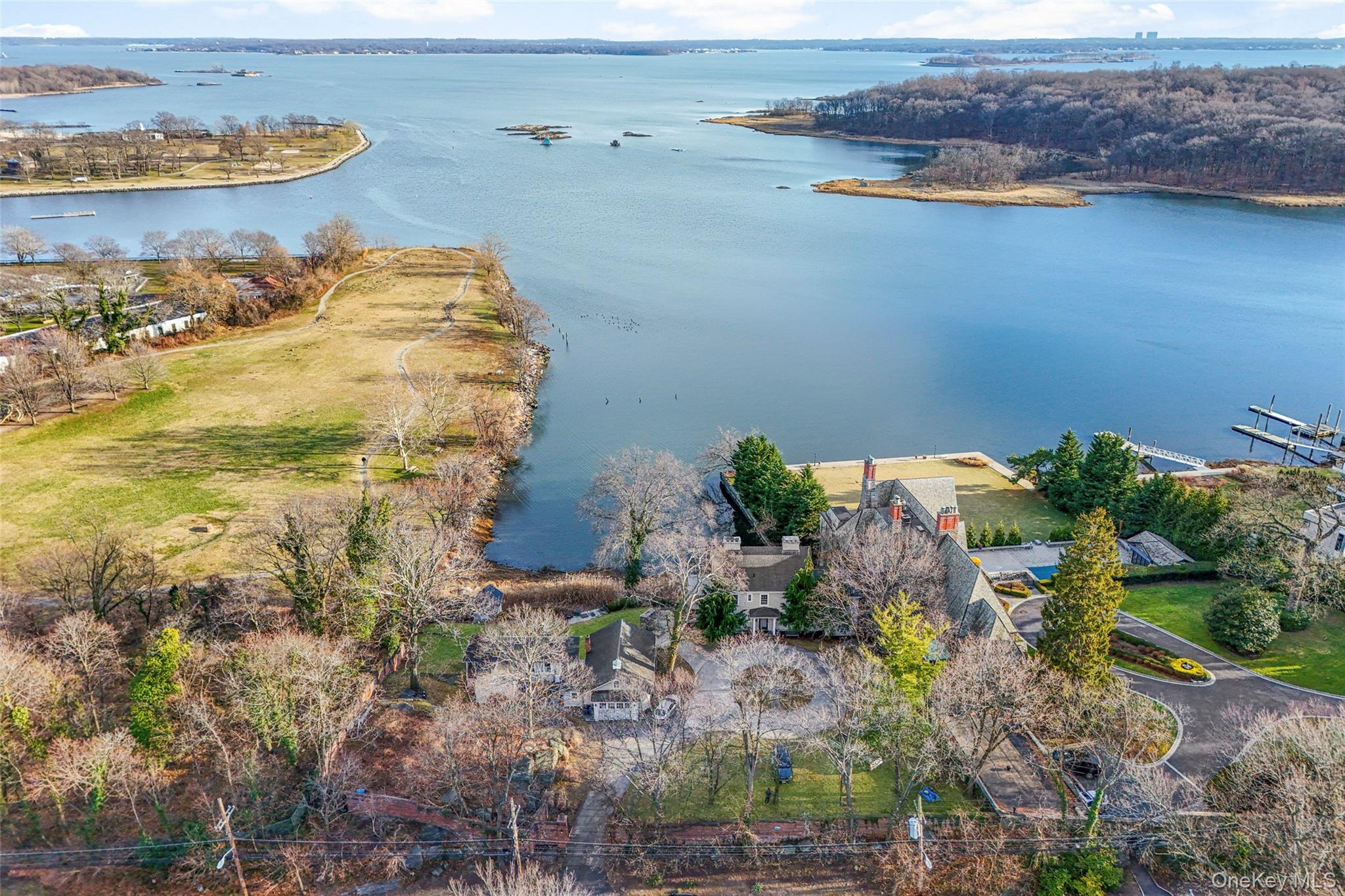 50 Shore Road Pelham, NY 10803 - Photo 18 of 28 a view of a lake with outdoor space