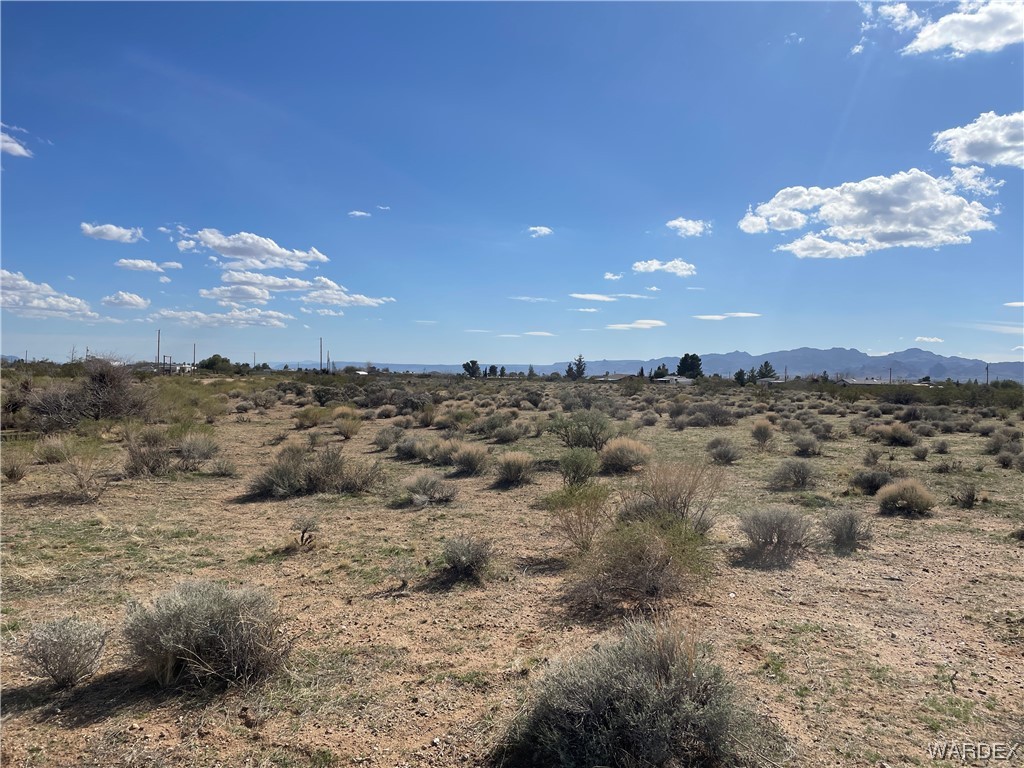 3999 Verde Road Golden Valley, AZ 86413 - Photo 1 of 18 a view of a sky