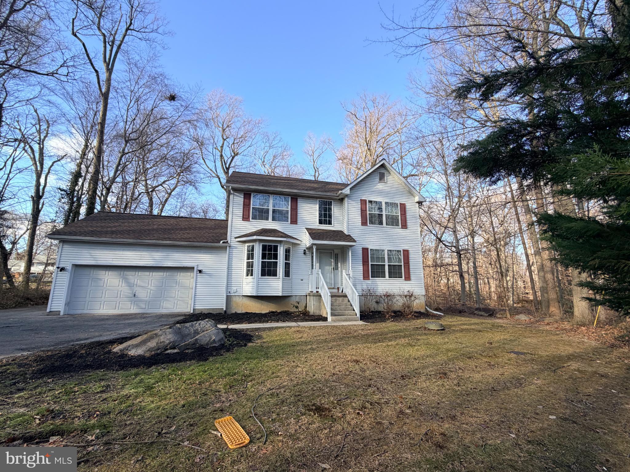 Charming home nestled in serene woodlands.