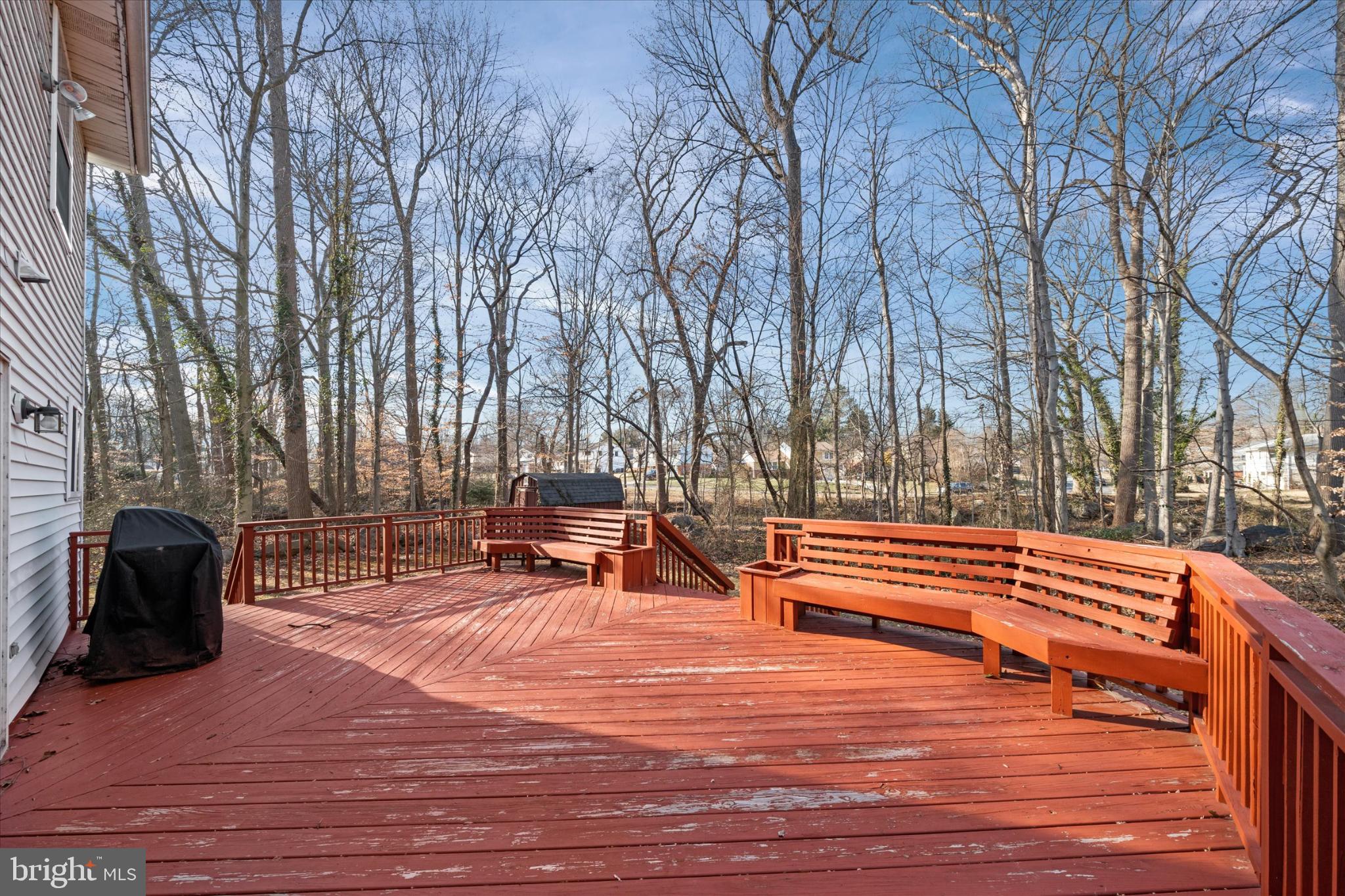 2218 Marsh Road Wilmington, DE 19810 - Photo 54 of 55 Spacious deck nestled among serene trees.