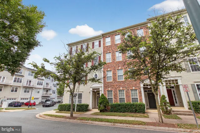 a view of a building with a street