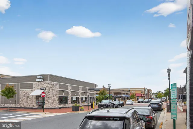 a view of a porch with furniture and a table
