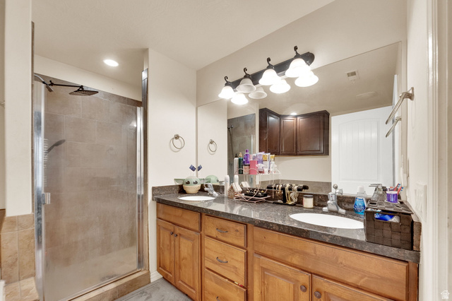 2026 Cres Drive South Mapleton, UT 84664 - Photo 8 of 18 Bathroom with double vanity and a stall shower