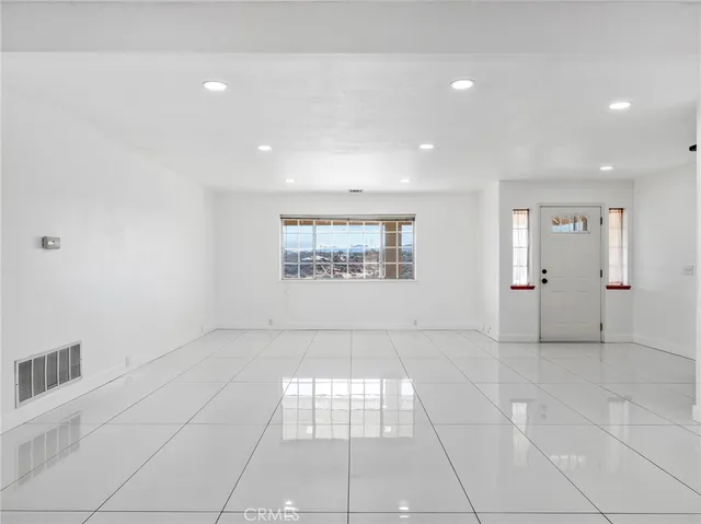 a kitchen with a sink and a window