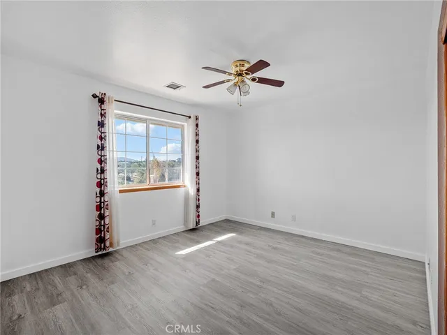 a bathroom with a shower and a toilet