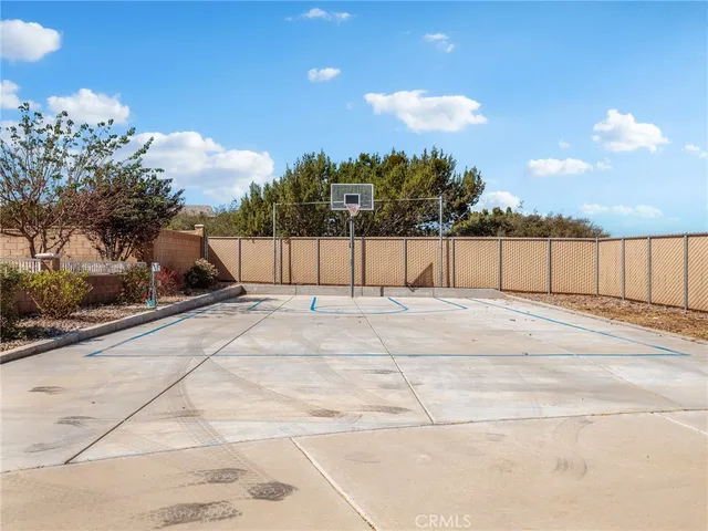 a view of a room with car parked