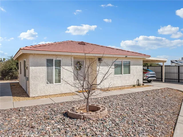 a view of balcony with furniture