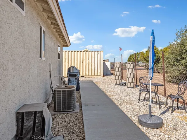 an aerial view of residential houses with city view
