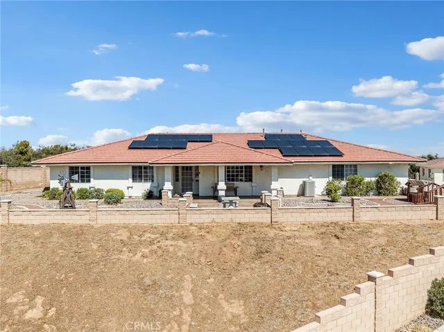 a view of a terrace with seating area