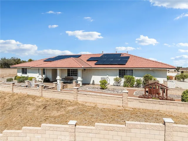 a view of a terrace with sitting area