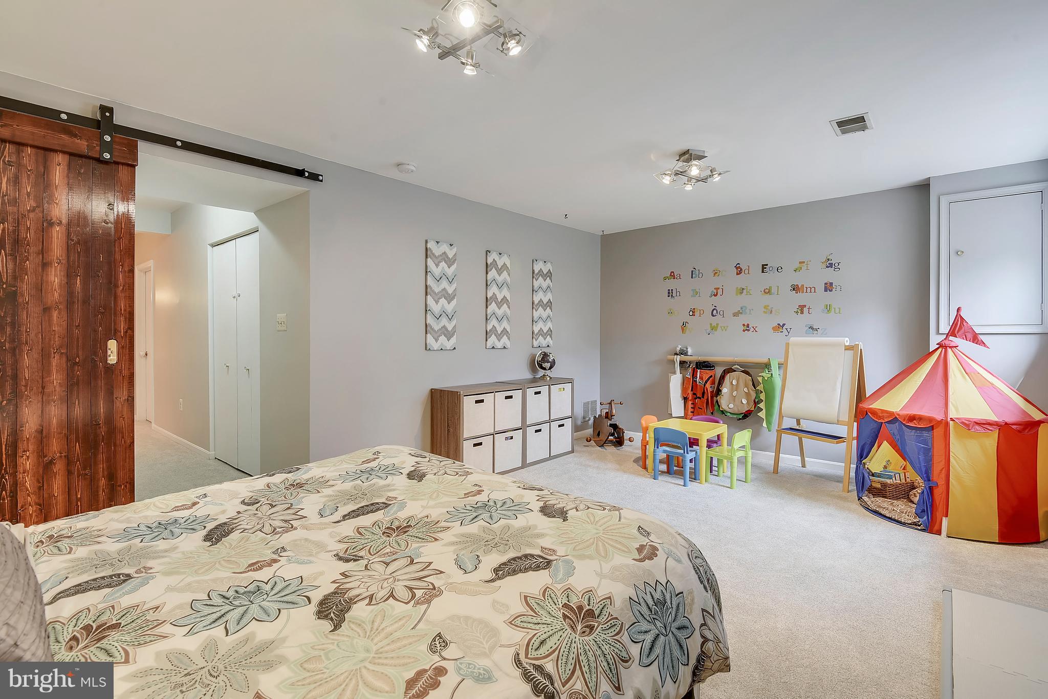 7433 Timberock Road Falls Church, VA 22043 - Photo 22 of 29 Recreation Room Boasts Barn Door for Privacy