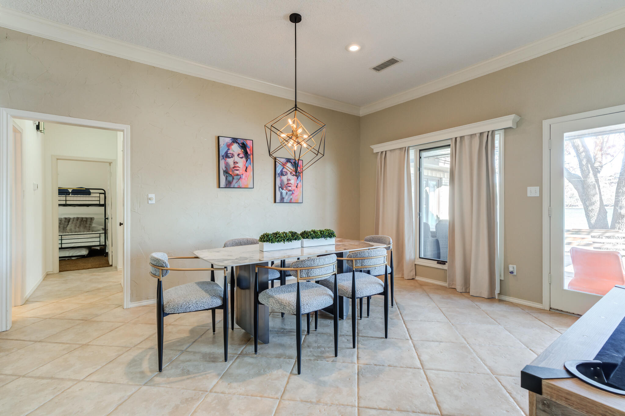 16 South Lake Shore Drive Ransom Canyon, TX 79366 - Photo 28 of 64 a view of a dining room with furniture and window