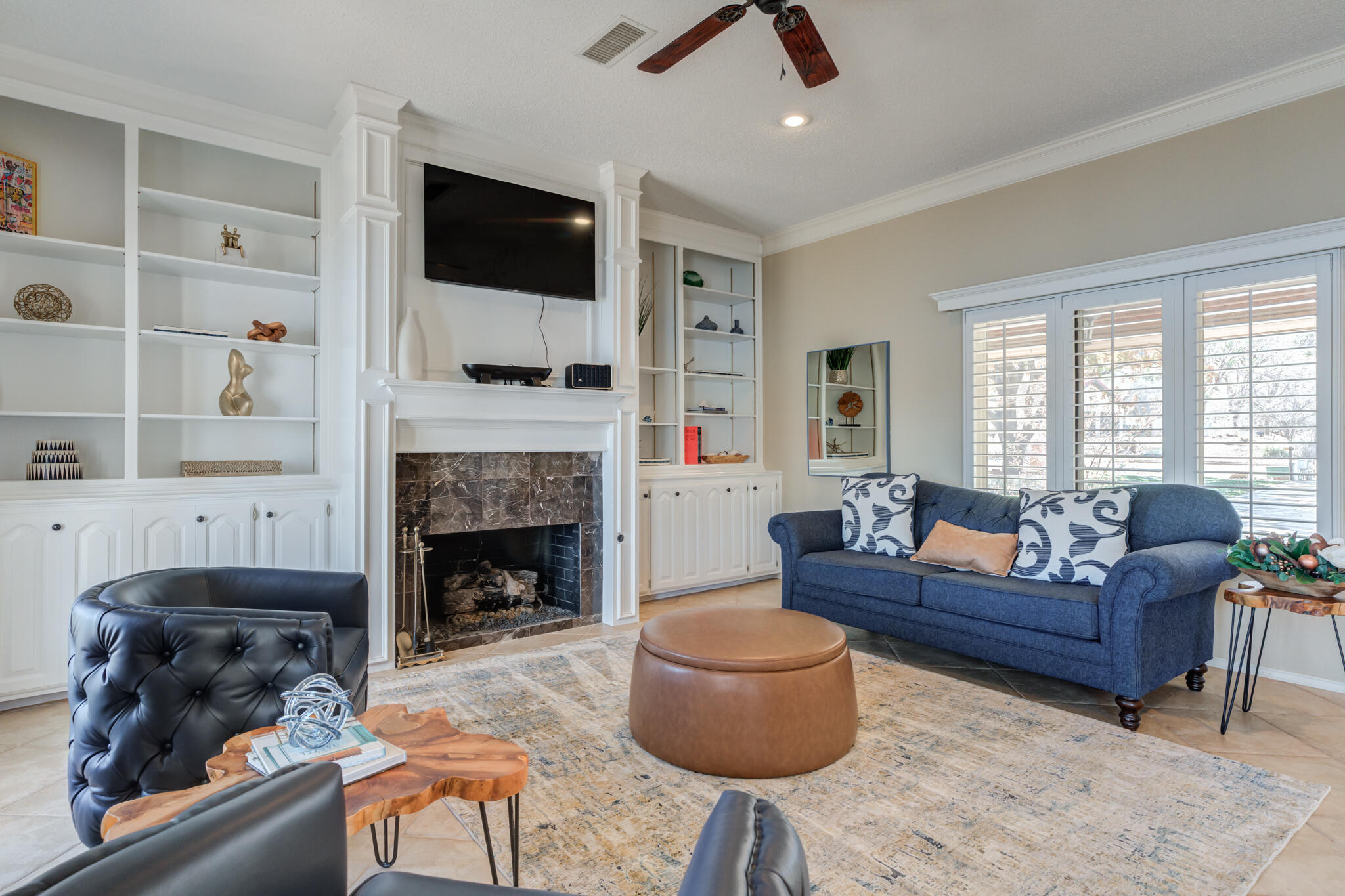 16 South Lake Shore Drive Ransom Canyon, TX 79366 - Photo 3 of 64 a living room with furniture and a fireplace