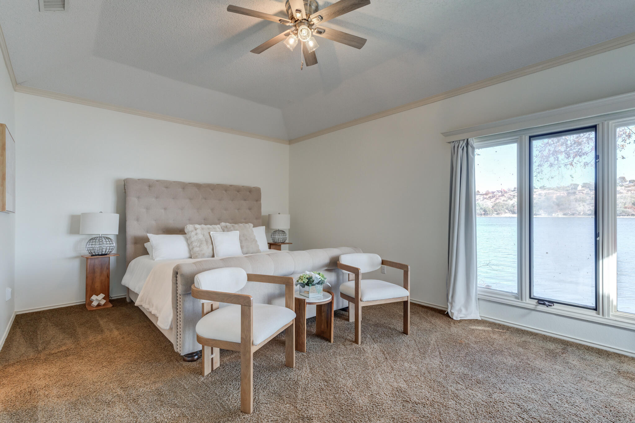 16 South Lake Shore Drive Ransom Canyon, TX 79366 - Photo 5 of 64 a bed room with a bed and a chair