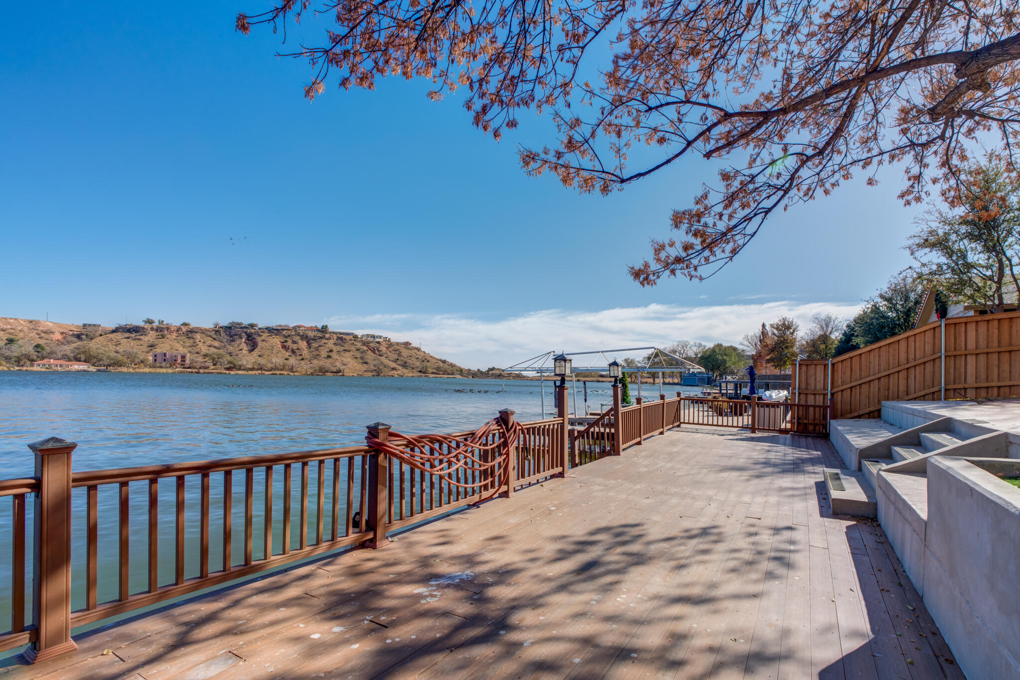 16 South Lake Shore Drive Ransom Canyon, TX 79366 - Photo 62 of 64 a view of a terrace with a bench