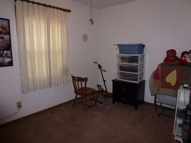 3 Deerefield Court Clinton, IL 61727 - Photo 13 of 29 a view of a workspace with furniture and a window