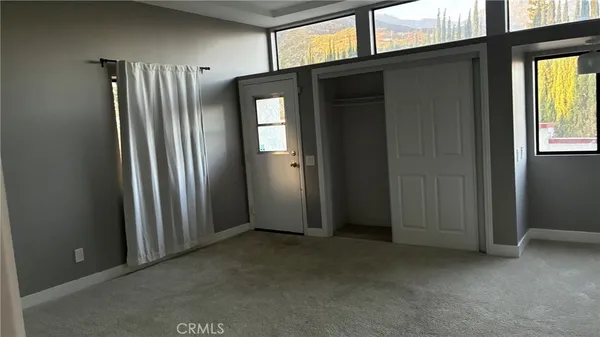 an empty room with windows