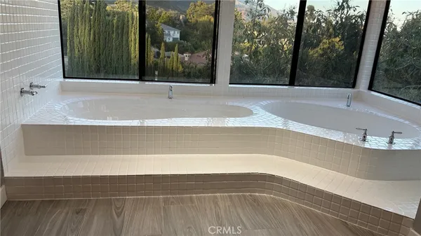 a view of a bathtub in a bathroom