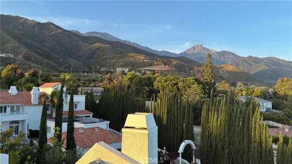 a view of a house with a mountain view
