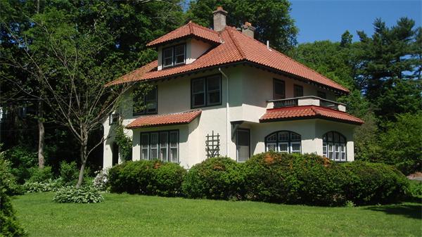 110 Adin Street Hopedale, MA 01747 - Photo 2 of 7 a front view of house with yard and green space